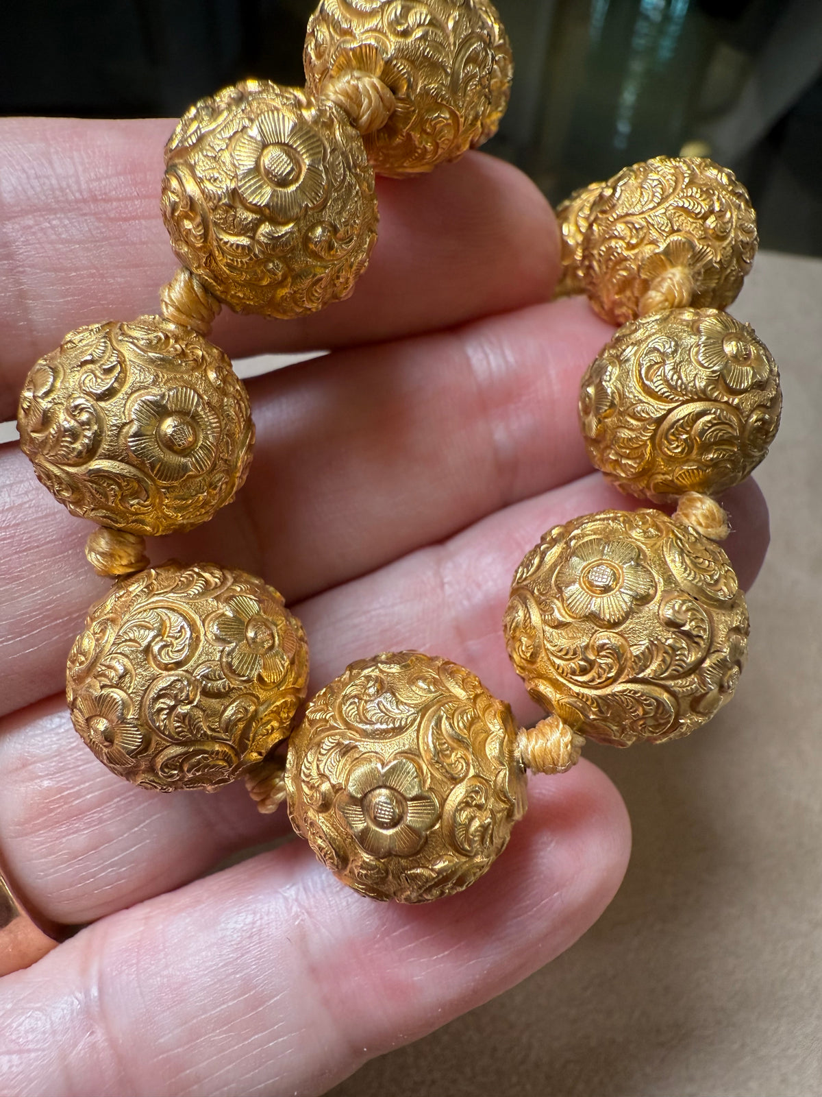Gold bead necklace